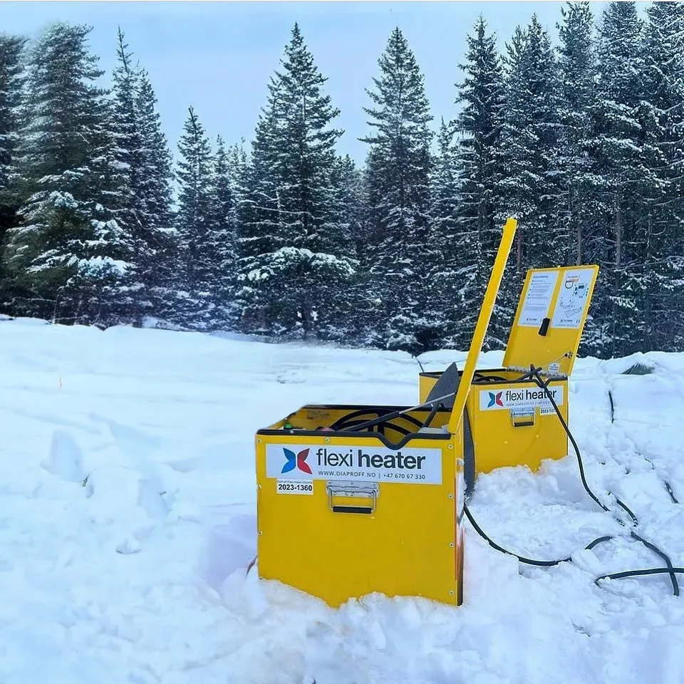 Flexi Heater Mini komplett teletiner i drift utendørs i snø og skogsområde.