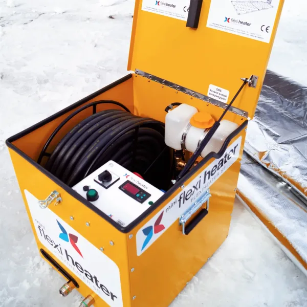 Flexi Heater Mini med åpent lokk, viser innvendige komponenter, slanger og trommeloppsett.